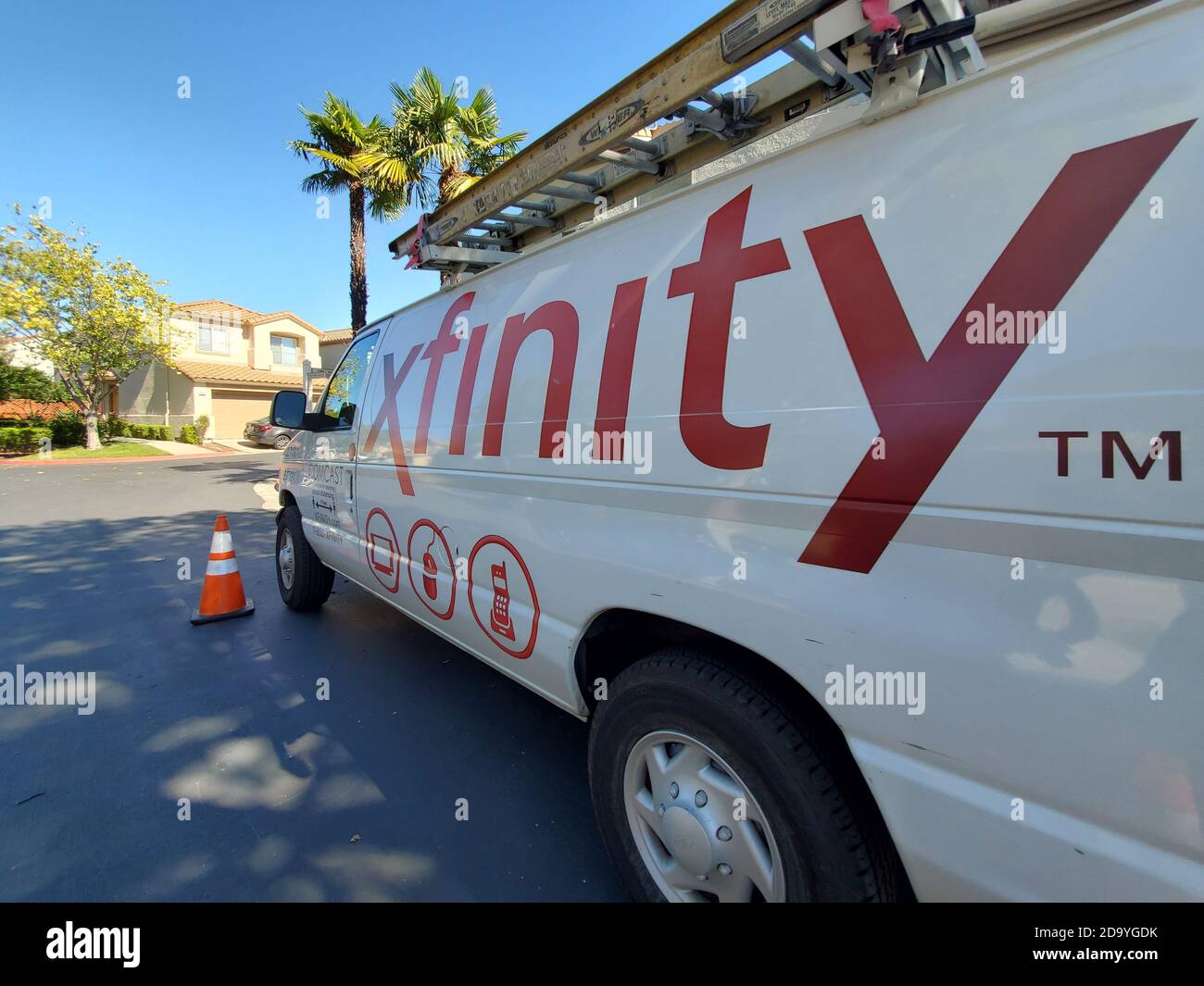 Comcast Xfinity truck parked on road in suburban neighborhood, San