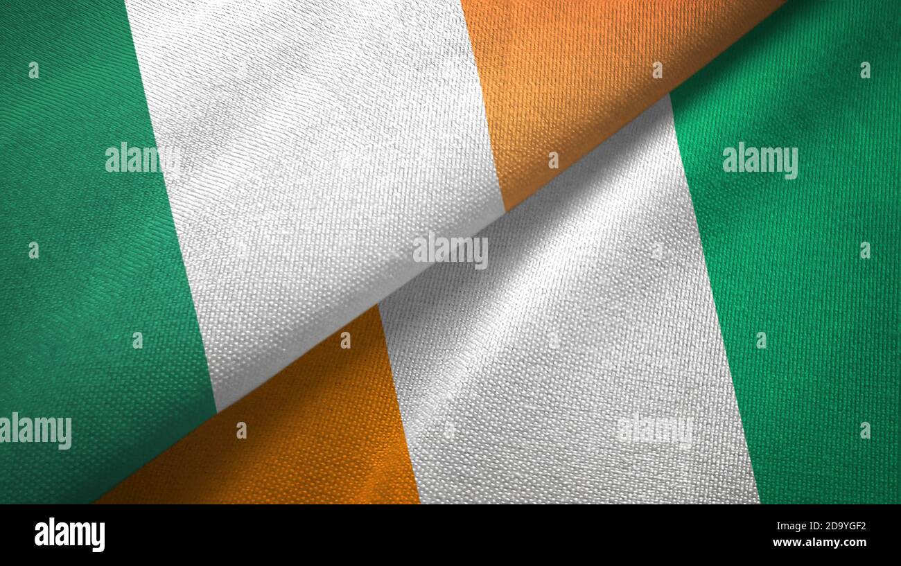 Ireland and Cote d'Ivoire Ivory coast two flags textile fabric texture ...