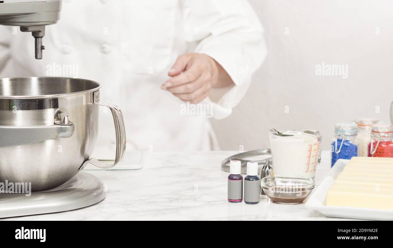 mixing-ingredients-in-standing-kitchen-mixer-to-make-buttercream