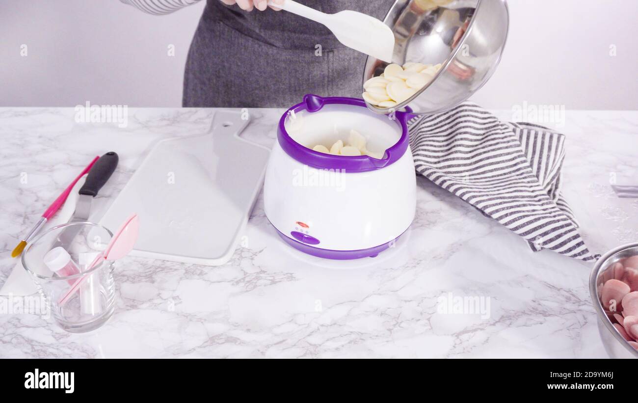 Step by step. Melting chocolate candy melts in an electric candy