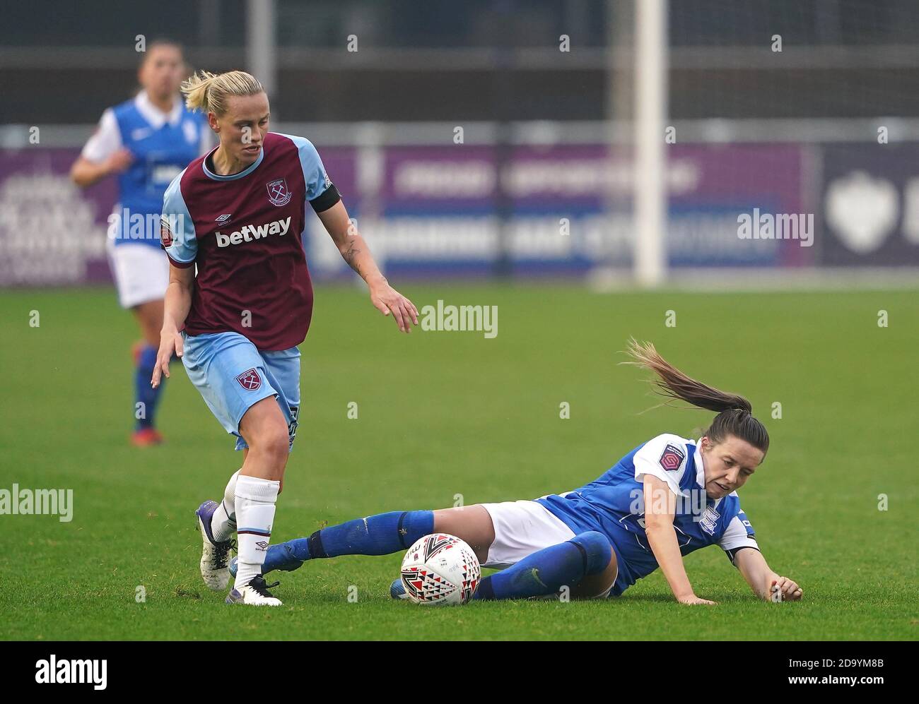 Birmingham City's Harriet Scott (right) and West Ham United's Emily van Egmond battle for the ball during the FA Women's Super League match at the SportNation.bet Stadium, Solihull. Stock Photo