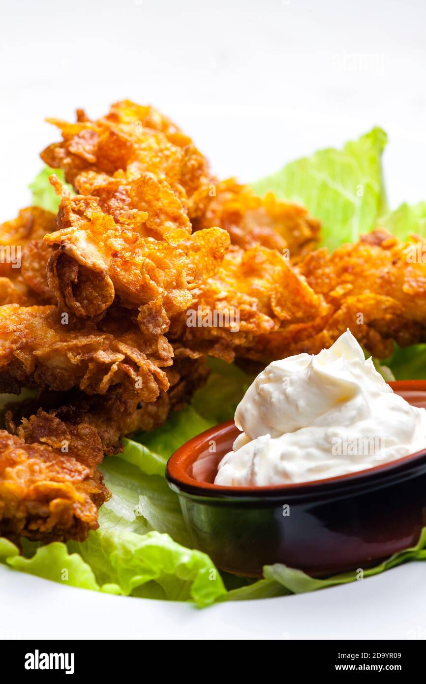 homemade chicken strips with garlic dip Stock Photo - Alamy