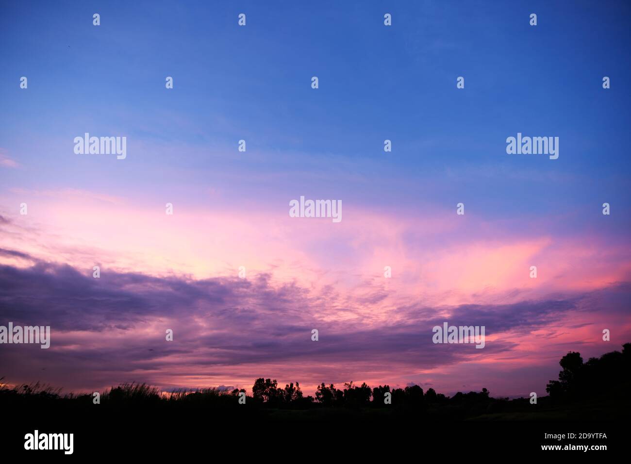 Romantic blue sky with clouds Stock Photo - Alamy