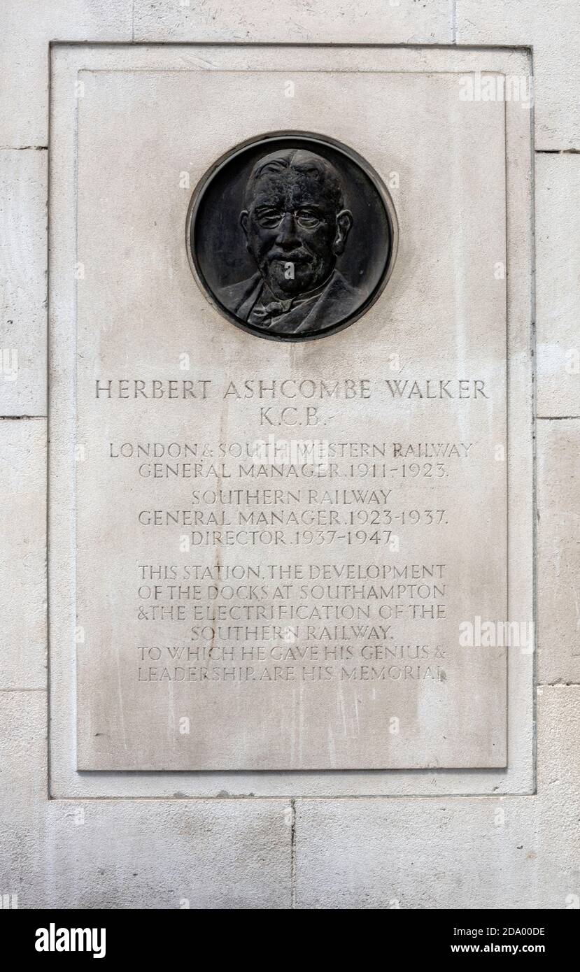 Memorial plaque to Sir Herbert Ashcombe Walker KCB at the entrance to Scott House, Waterloo Railway Station Concourse, Waterloo, London, England, UK. Stock Photo