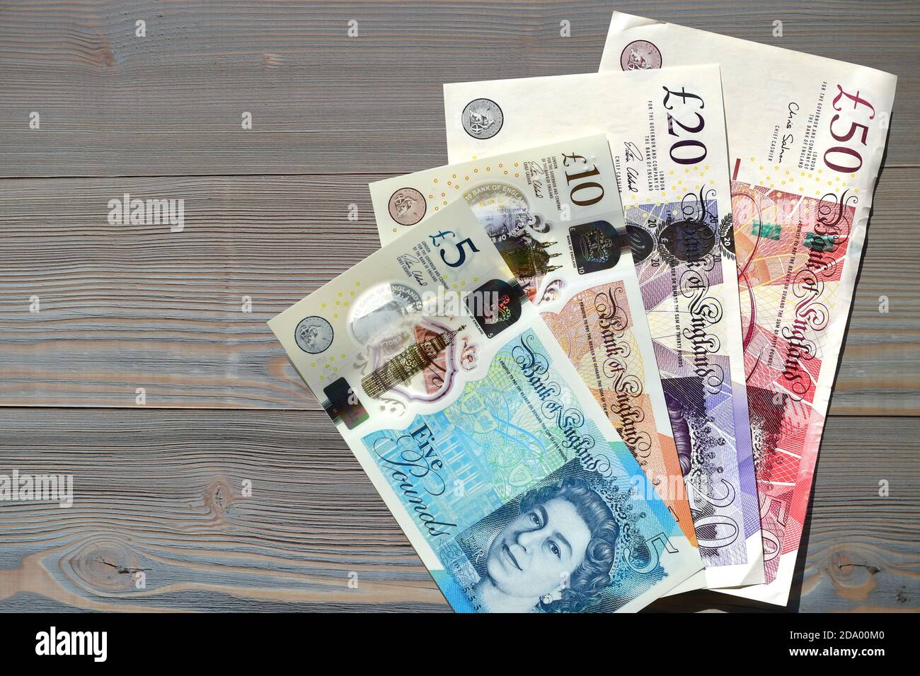 money British pound bill banknotes save expenses earnings Stock Photo