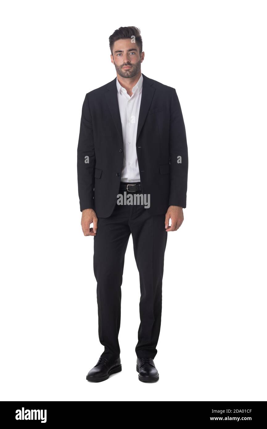 Full length portrait of young handsome business man in black suit studio isolated on white background Stock Photo