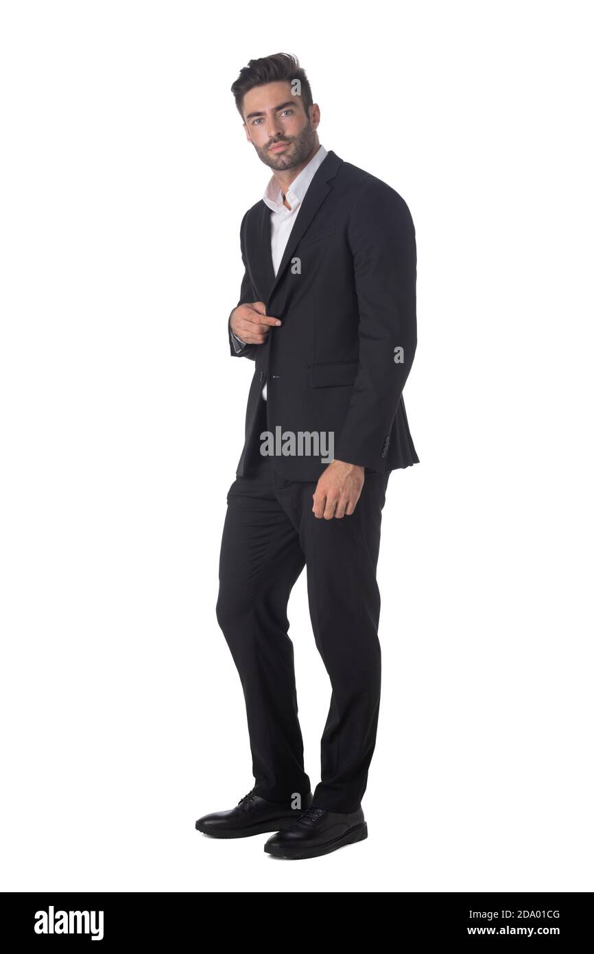 Full length portrait of young handsome business man in black suit ...