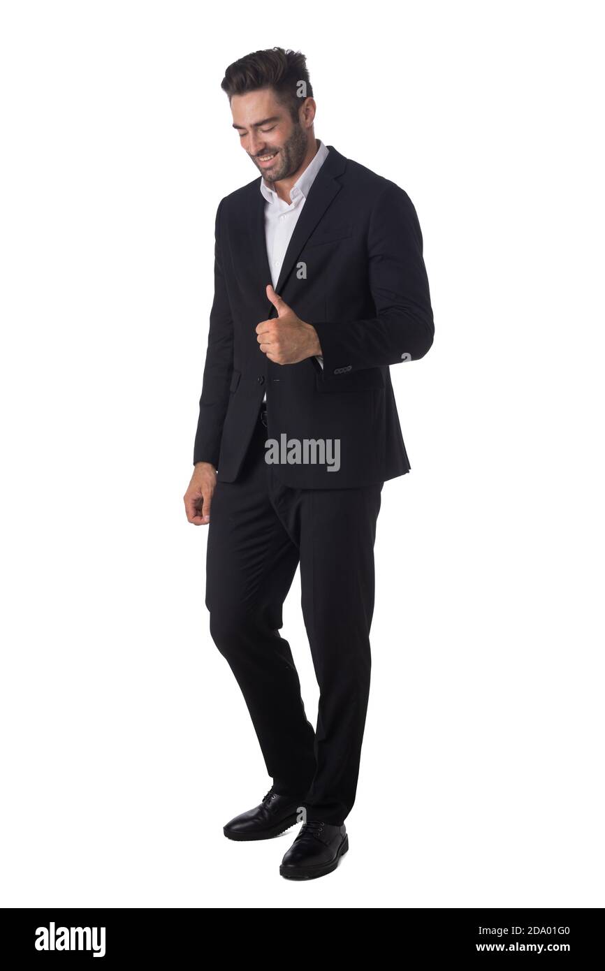 Full length portrait of young handsome business man in black suit ...