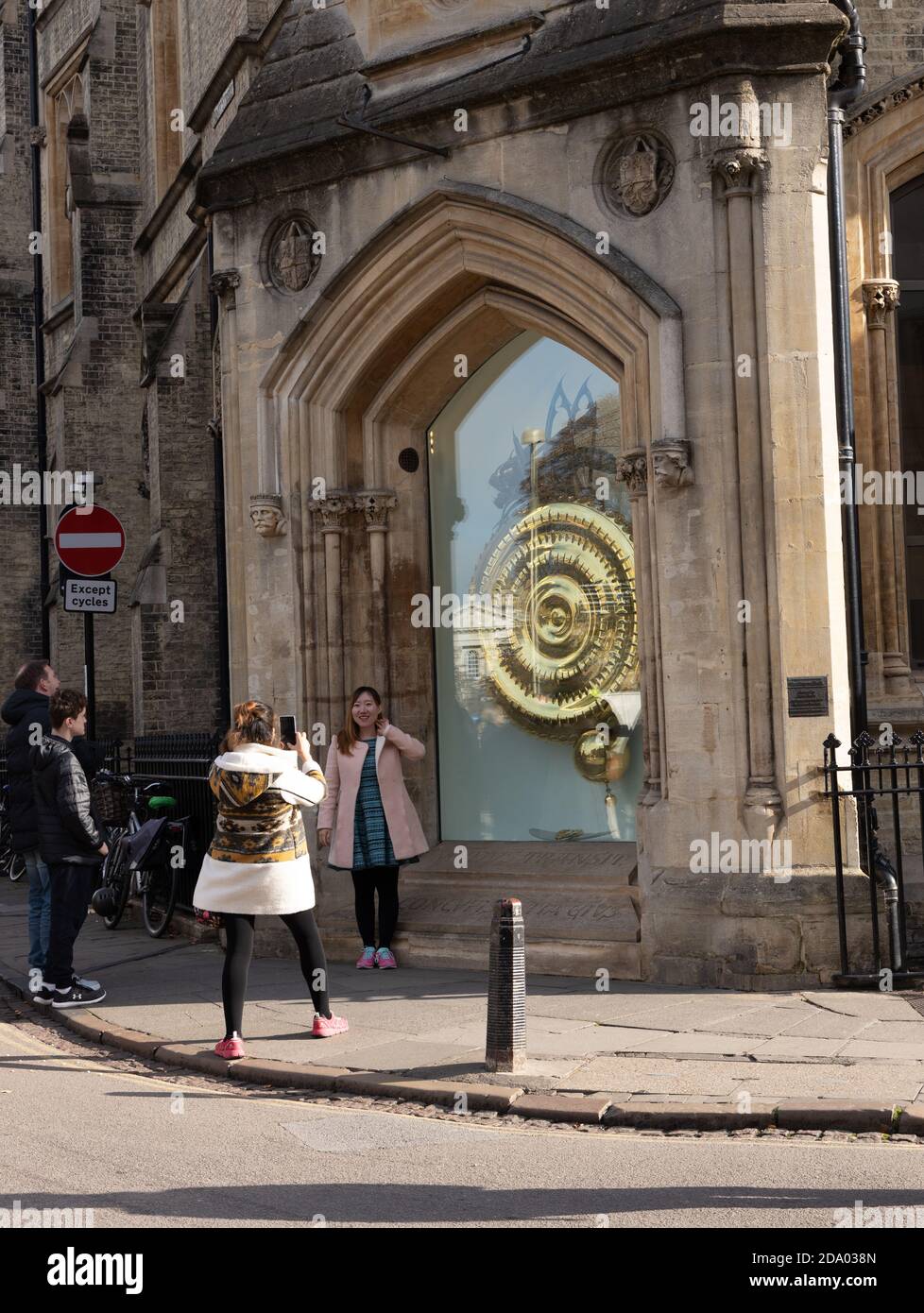 Tourists taking photos with Corpus Clock Cambridge England Stock Photo