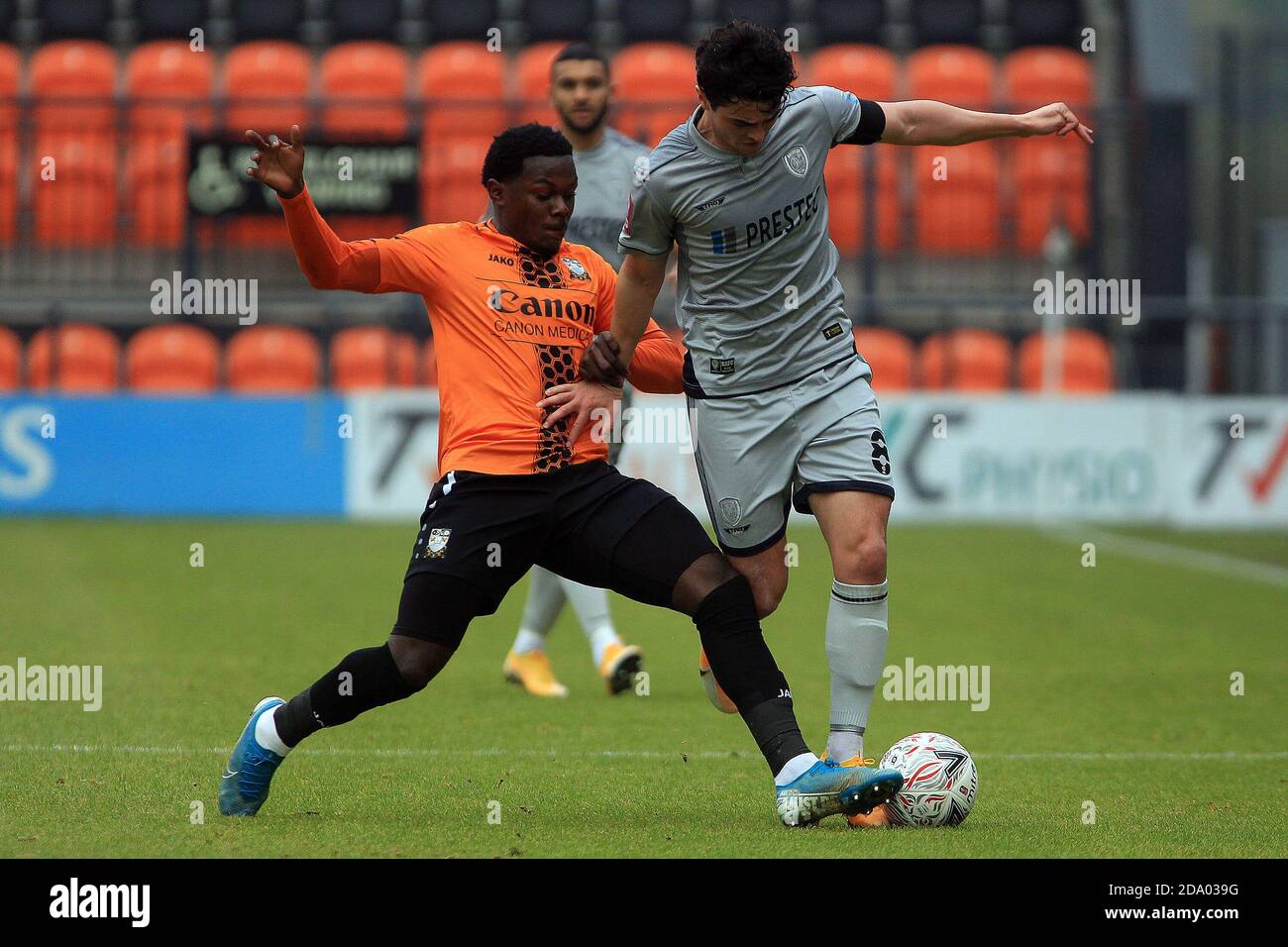 London, UK. 08th Nov, 2020. Joe Powell of Burton Albion (R) in action with Ephron Mason-Clark of Barnet (L). The Emirates FA Cup, 1st round match, Barnet v Burton Albion at the Hive Stadium in London on Sunday 8th November 2020. this image may only be used for Editorial purposes. Editorial use only, license required for commercial use. No use in betting, games or a single club/league/player publications. pic by Steffan Bowen/Andrew Orchard sports photography/Alamy Live news Credit: Andrew Orchard sports photography/Alamy Live News Stock Photo