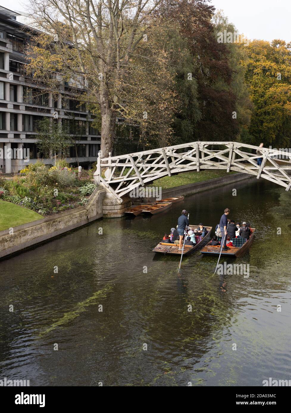 Mathematical Bridge and two punts on the River Cam in Cambridge. Local legend says Isaac Newton built this footbridge without any screws and bolts Stock Photo