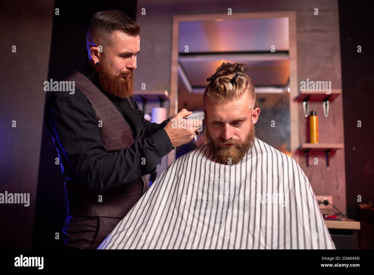 handsome caucasian man at the hairdresser in barber shop, barber male ...