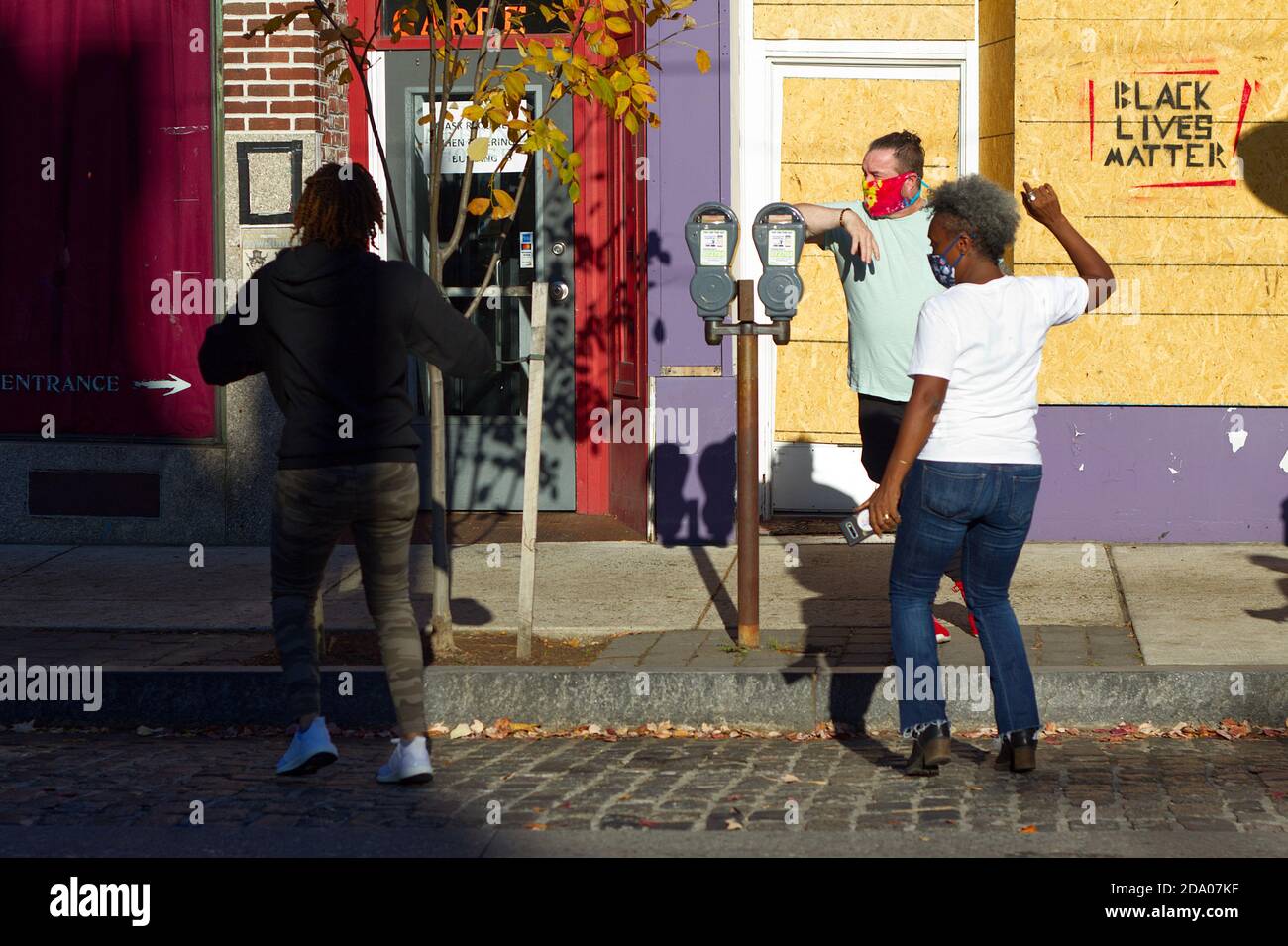 Philadelphia, PA, USA - November 7, 2020: Neighbors celebrate the victory of U.S. President-Elect Joe Biden in Philadelphia's Mt. Airy neighborhood. Stock Photo