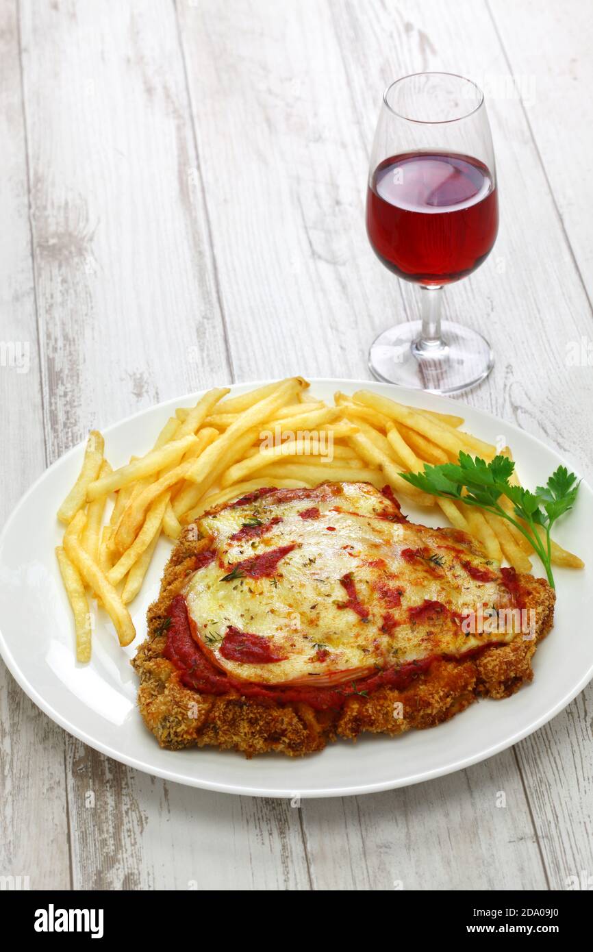 milanesa a la napolitana, Argentina breaded beef cutlet with mozzarella cheese & tomato sauce Stock Photo