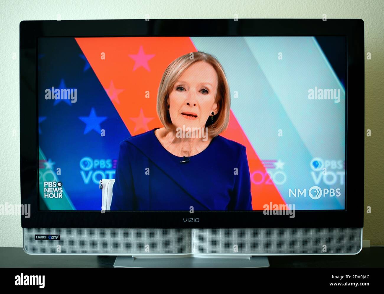 A TV screen grab of PBS NewsHour anchor Judy Woodruff reporting on