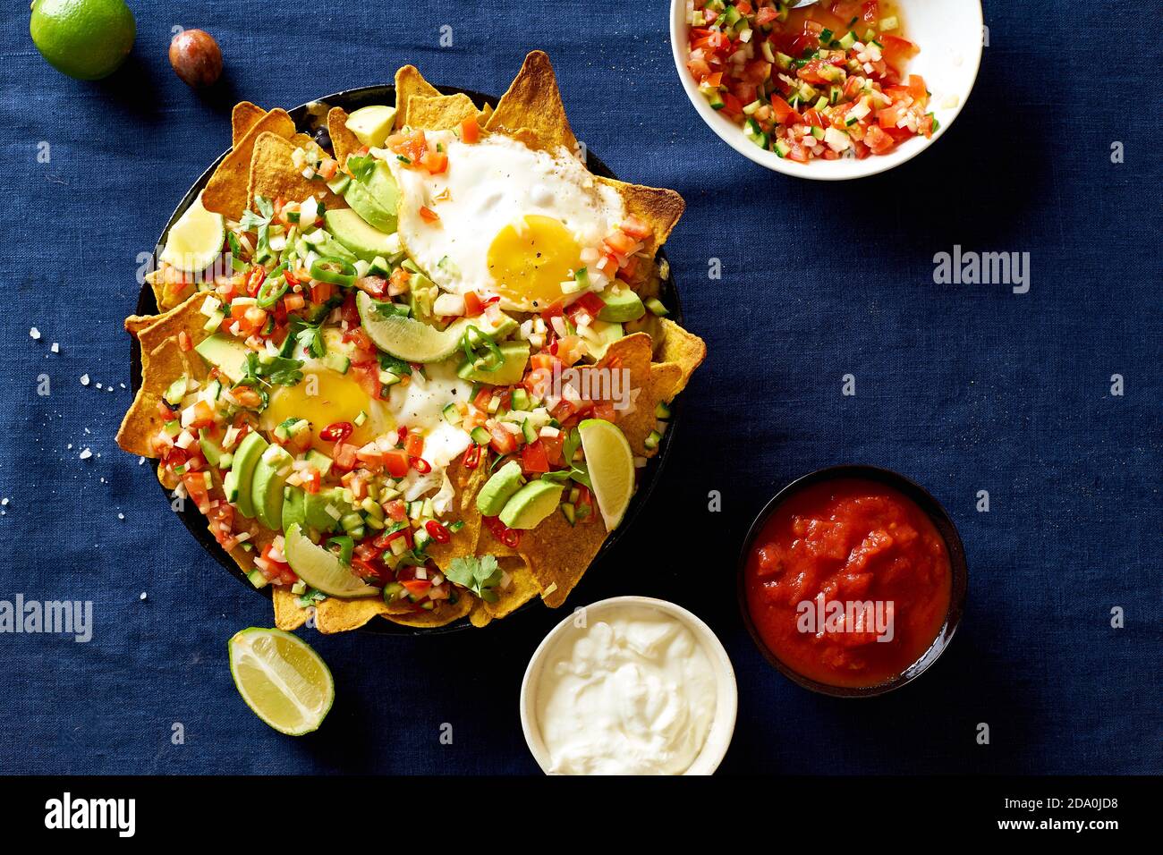Chilaquiles mexican breakfast made of black beans, corn, tortilla chips