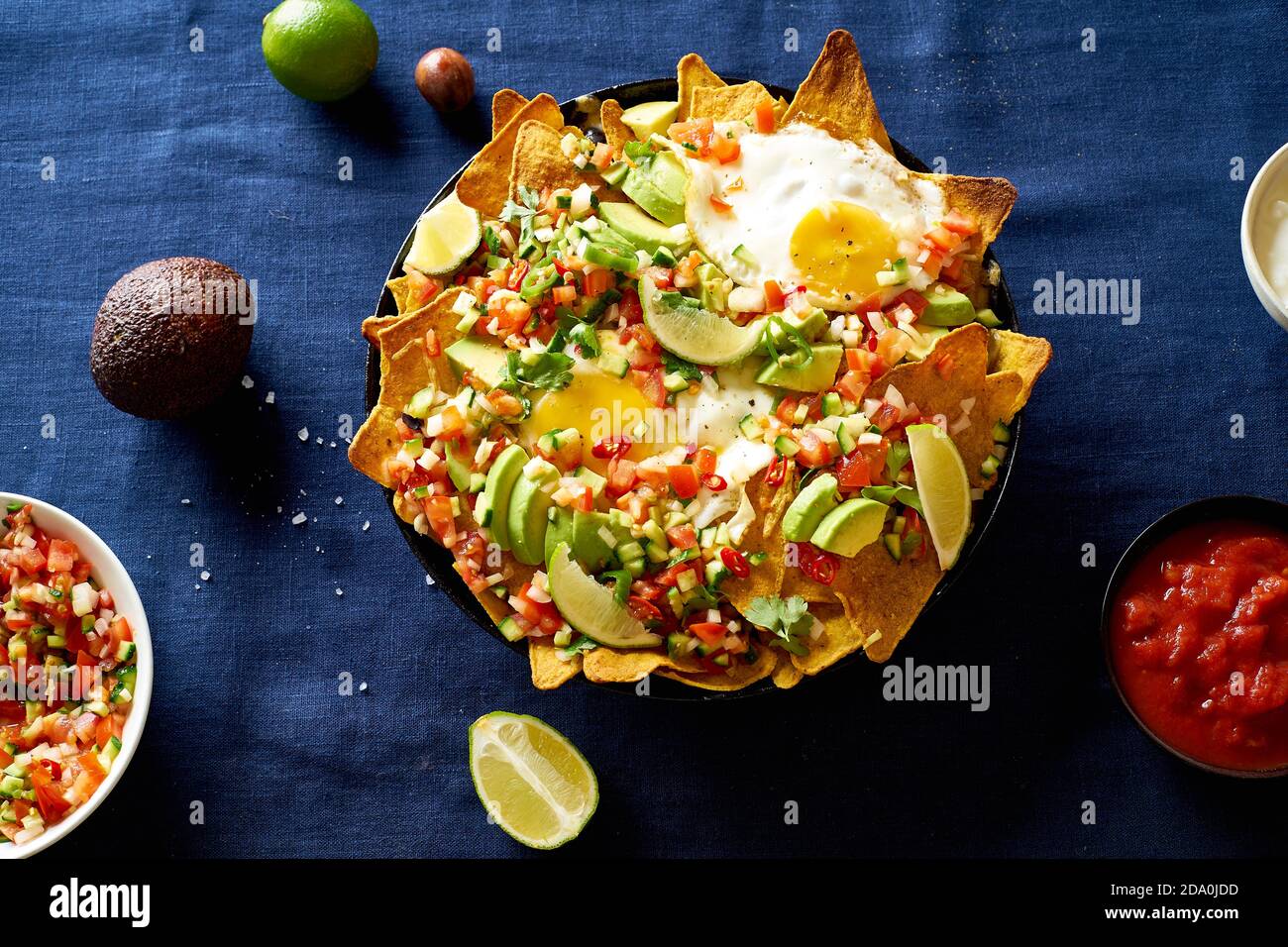 Chilaquiles mexican breakfast made of black beans, corn, tortilla chips