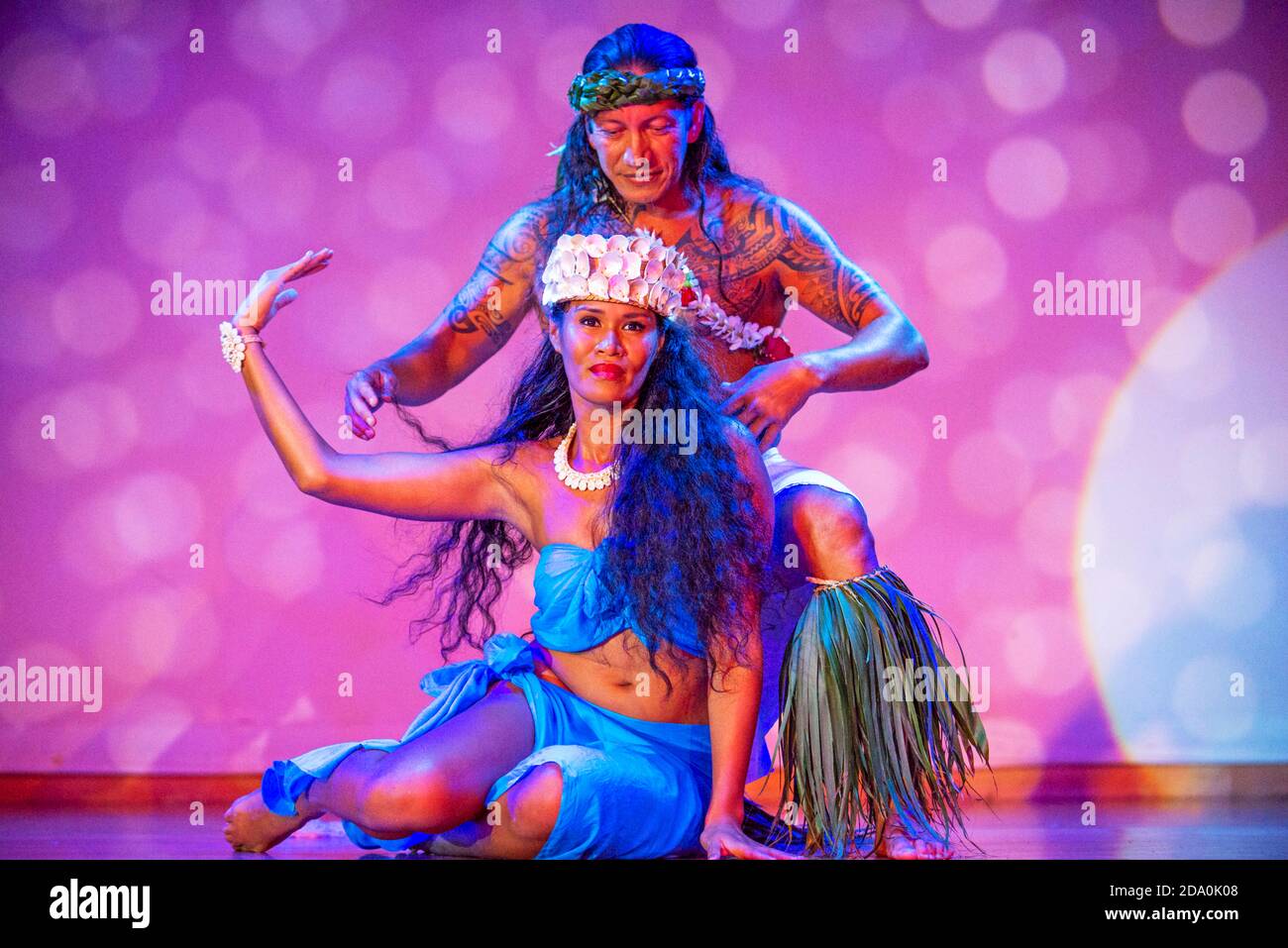 Dancing show of polynesian dances on Paul Gauguin cruise ship. France, French Polynesia, Polynesian, South Pacific. Stock Photo