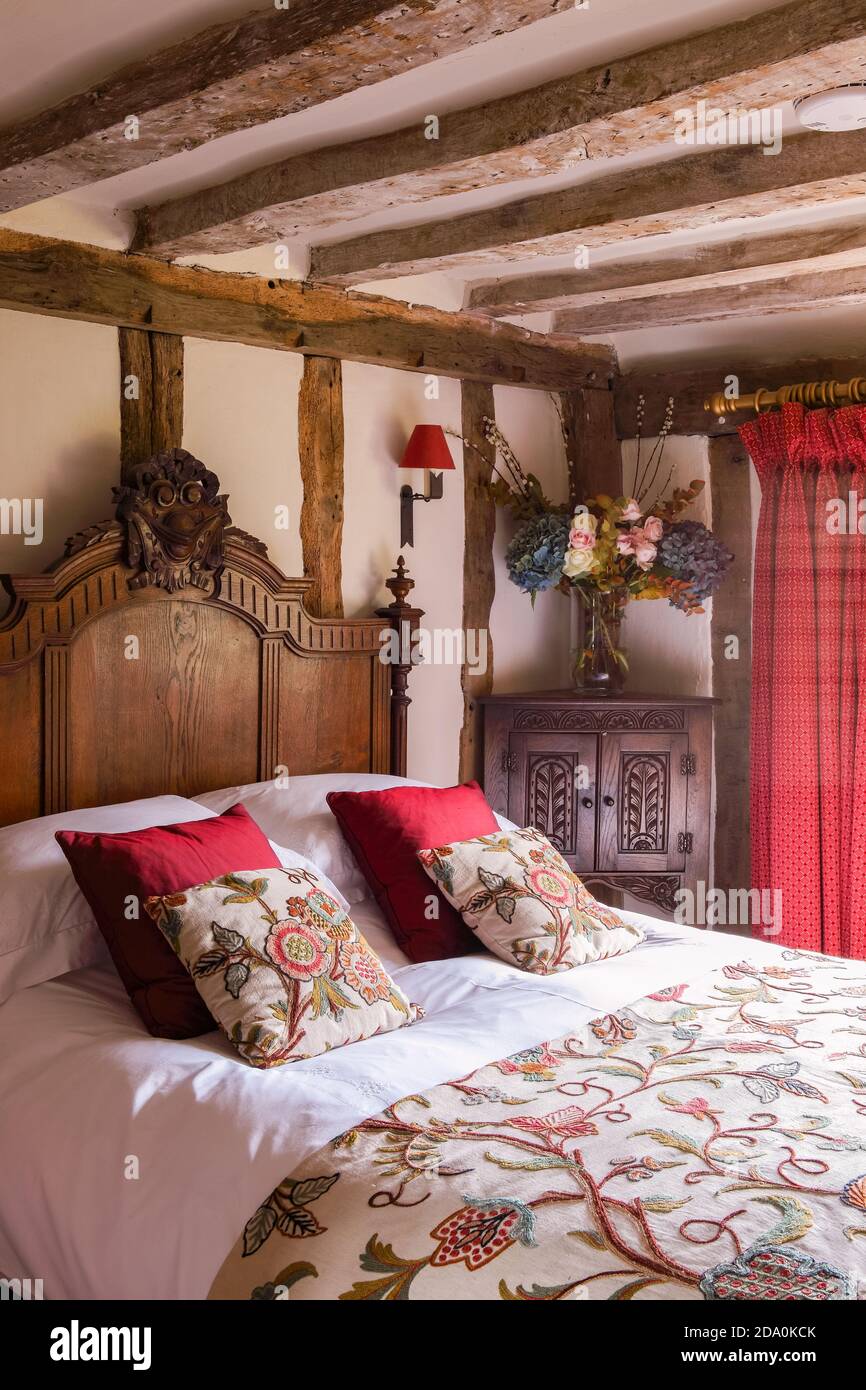Interior of an English cottage with double bed in timber framed room Stock  Photo - Alamy