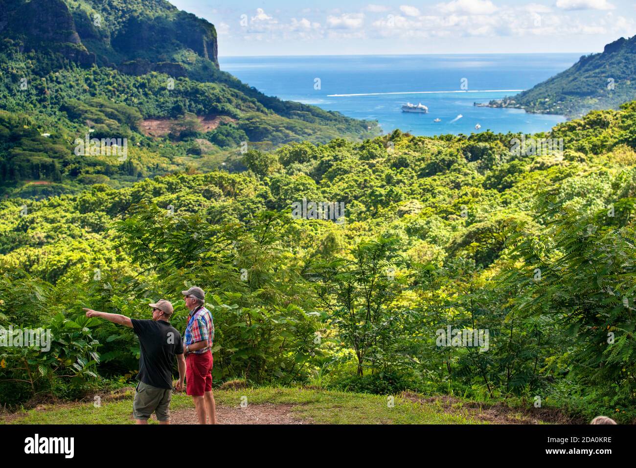 Nature photography workshop in front of wolf enclosure to photograph wolves, Moorea, French Polynesia, Society Islands, South Pacific. Stock Photo