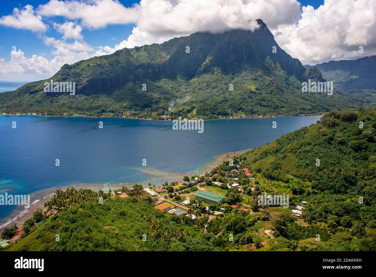 Typical houses, road, and reef see, Moorea island (aerial view