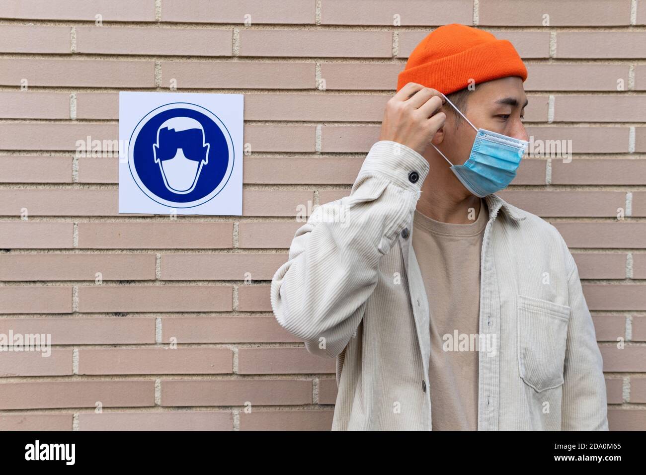 Taking Off Mask High Resolution Stock Photography and Images - Alamy