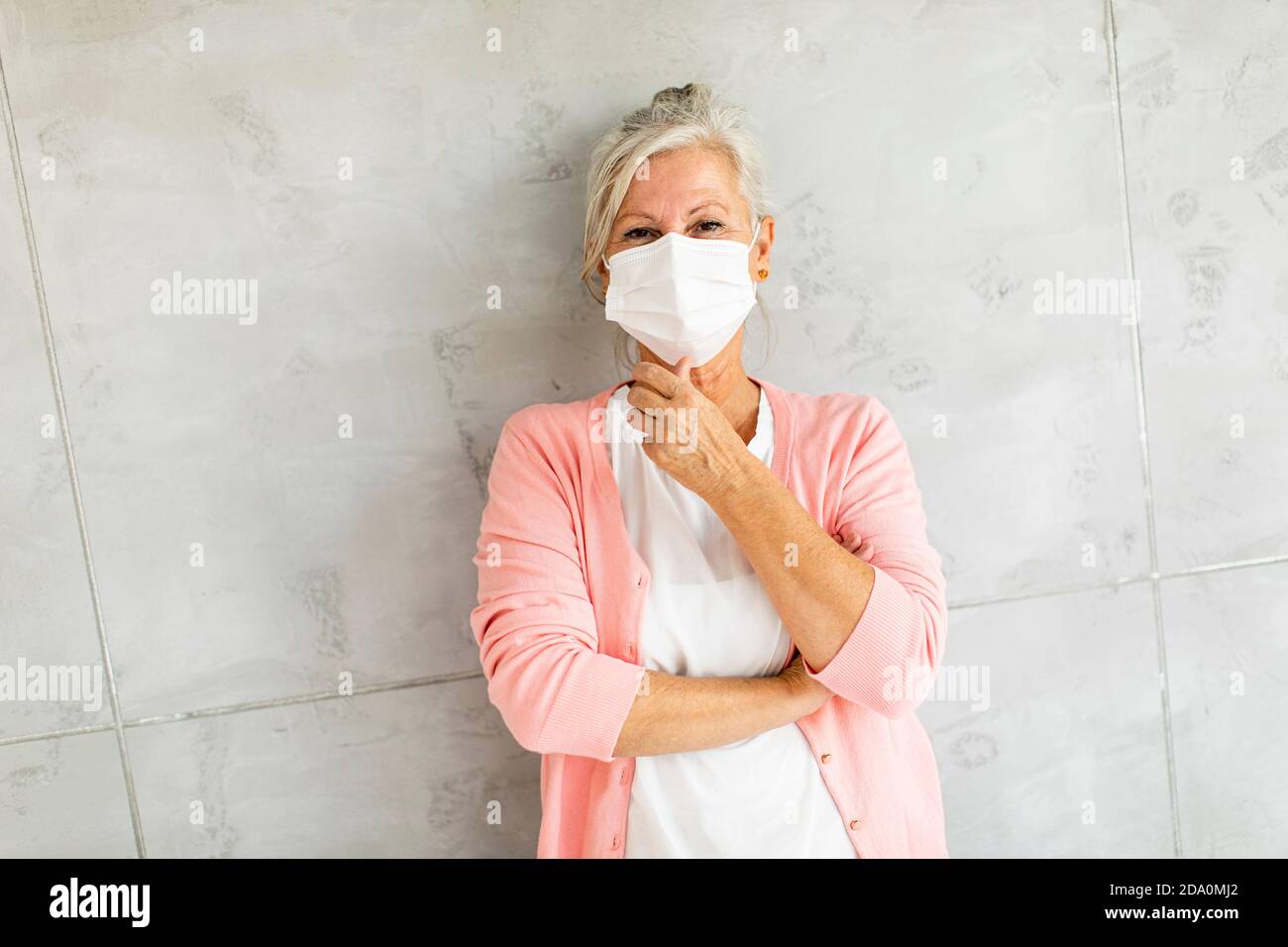 Mature woman wearing facial mask hi-res stock photography and images ...