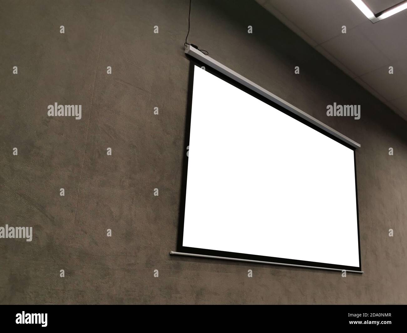 projector screen on the wall Stock Photo Alamy