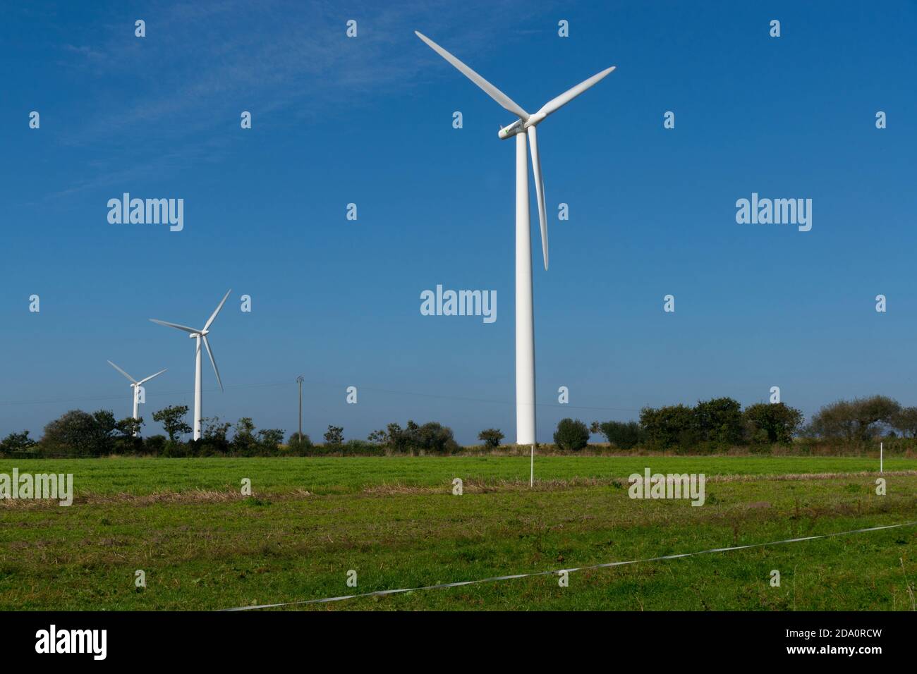 Wind turbines and blue sky Stock Photo - Alamy