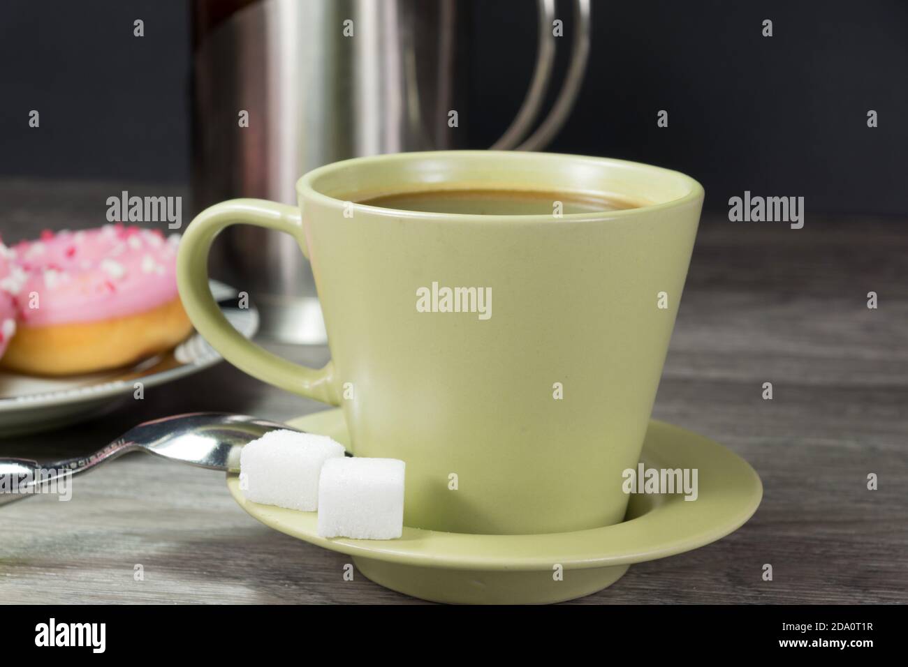 A cup of fresh coffee and lump of sugar Stock Photo - Alamy