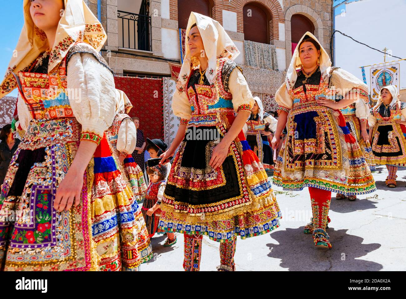 Women dressed in the typical costume of Lagartera during the procession of Corpus Christi. Lagartera, Toledo, Castilla - La Mancha, Spain, Europe Stock Photo
