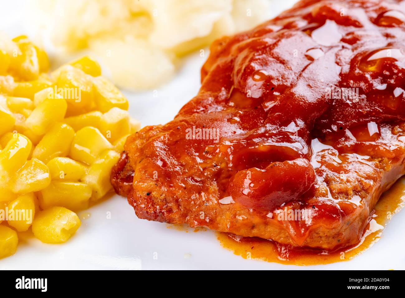 Meat and vegetable portion of a TV dinner Stock Photo - Alamy