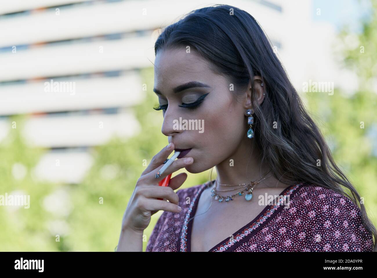 Slim cigarette hires stock photography and images Alamy