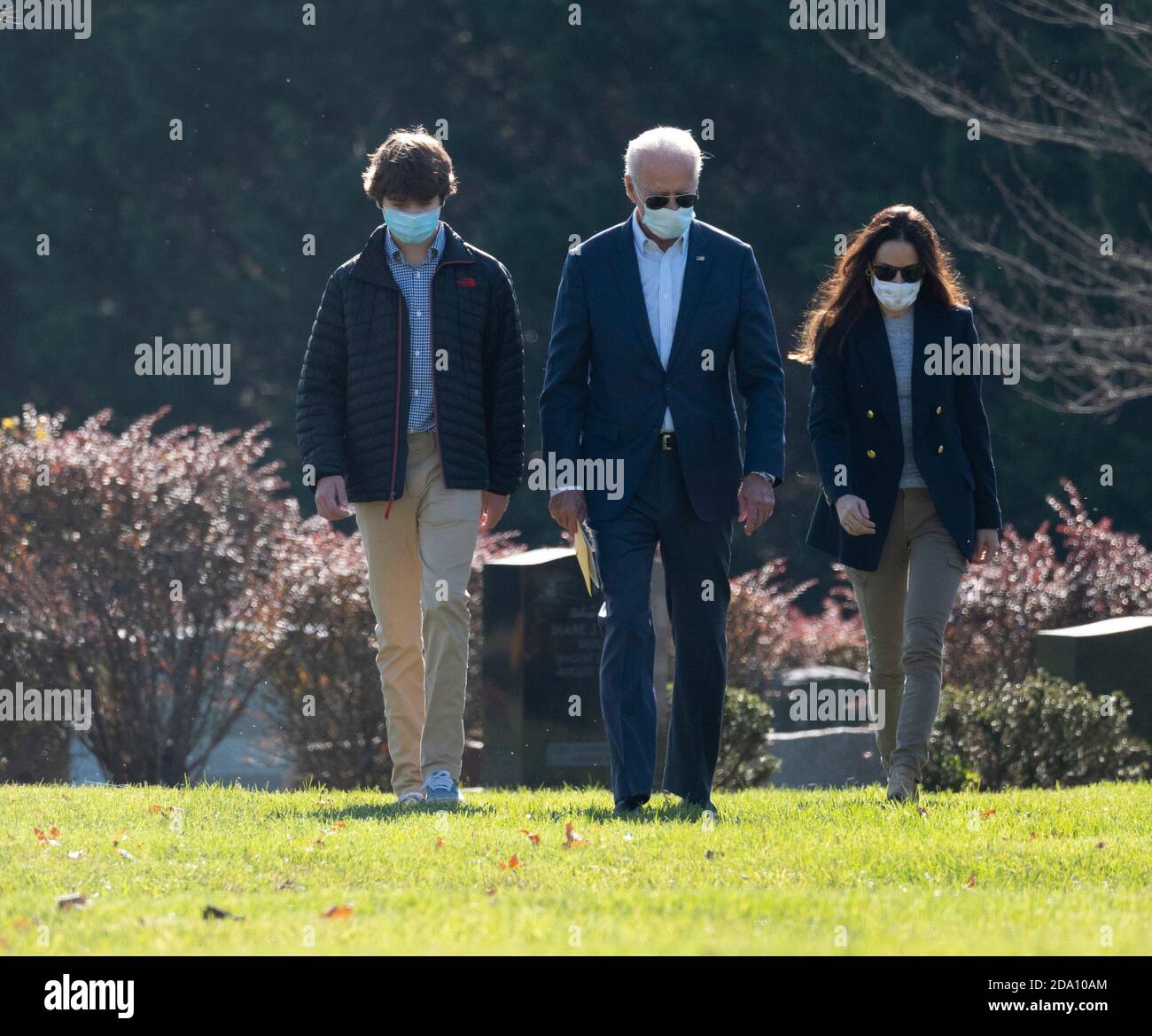 November 8, 2020: President-elect JOE BIDEN, center, walks with his grandson ROBERT 'Hunter' BIDEN II, left, and daughter-in-law HALLIE BIDEN (Right, widow of Beau Biden) to visit his late son Beau's gravesite at a church service at St. Joseph's on the Brandywine Roman Catholic cemetery in Wilmington, Delaware. Credit: Brian Branch Price/ZUMA Wire/Alamy Live News Stock Photo