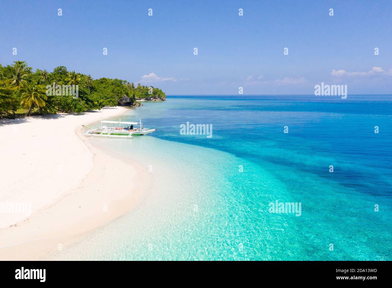 White sand beach and blue sea. view from above. Mahaba Island, Philippines. Summer and travel vacation concept. Stock Photo