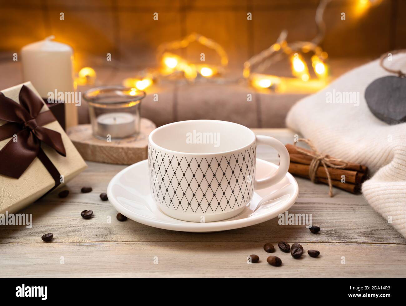 Empty white Cup on a saucer on a festive background. Stock Photo