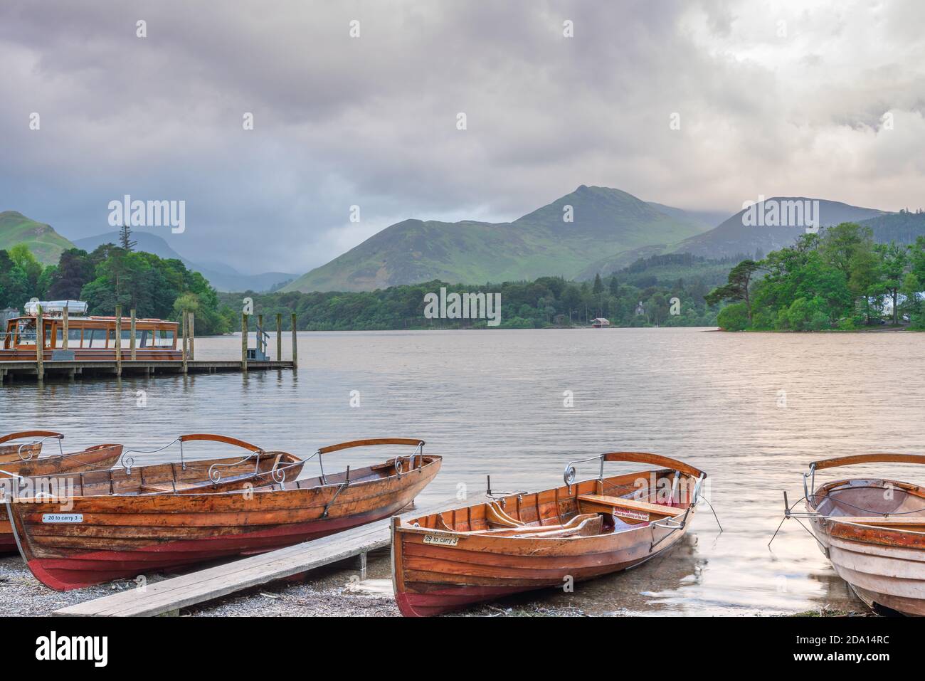 Waiting for customers. Rowing boats on Derwentwater, in the English Lake District. Stock Photo