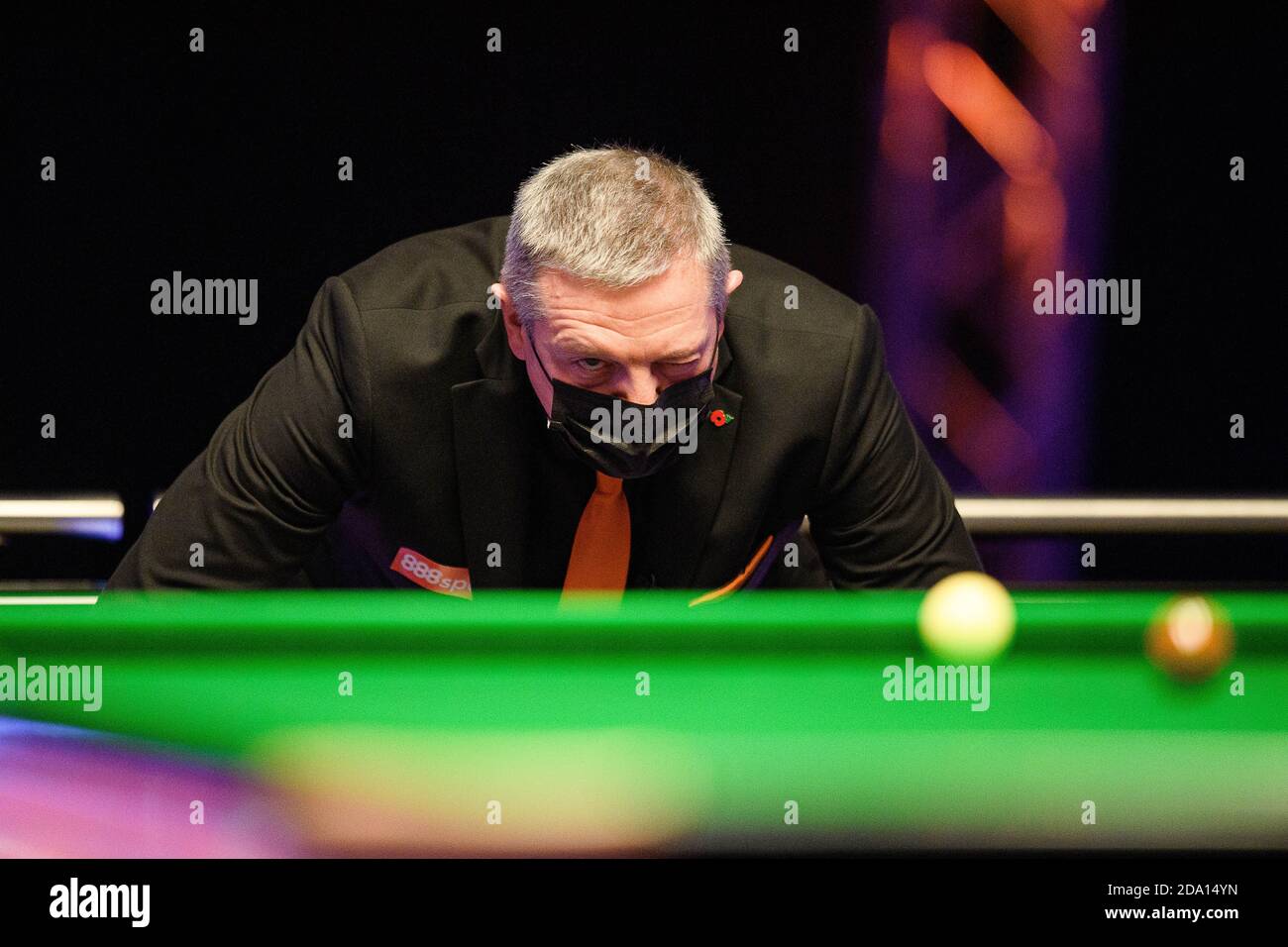 MILTON KEYNES, UNITED KINGDOM. 06th Nov, 2020. Referee: Rob Spencer checks the balls on the table during the  2020 888Sport Champion of Champions Snooker Final between Neil Robertson and Mark Allen at Marshall Arena on Friday, November 06, 2020 in MILTON KEYNES, ENGLAND. Credit: Taka G Wu/Alamy Live News Stock Photo