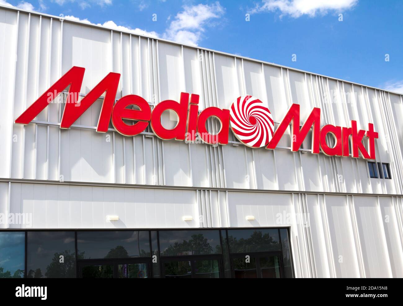 Entry of a Media Markt store. Mediamarkt is a German chain of stores selling consumer electronics with numerous branches throughout Europe and Asia. Stock Photo