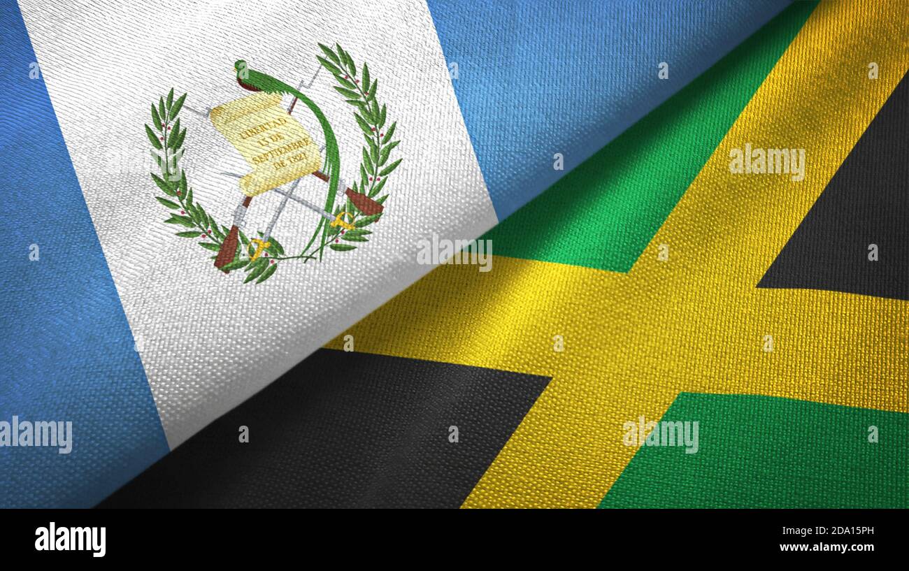 Guatemala and Jamaica two flags textile cloth, fabric texture Stock Photo