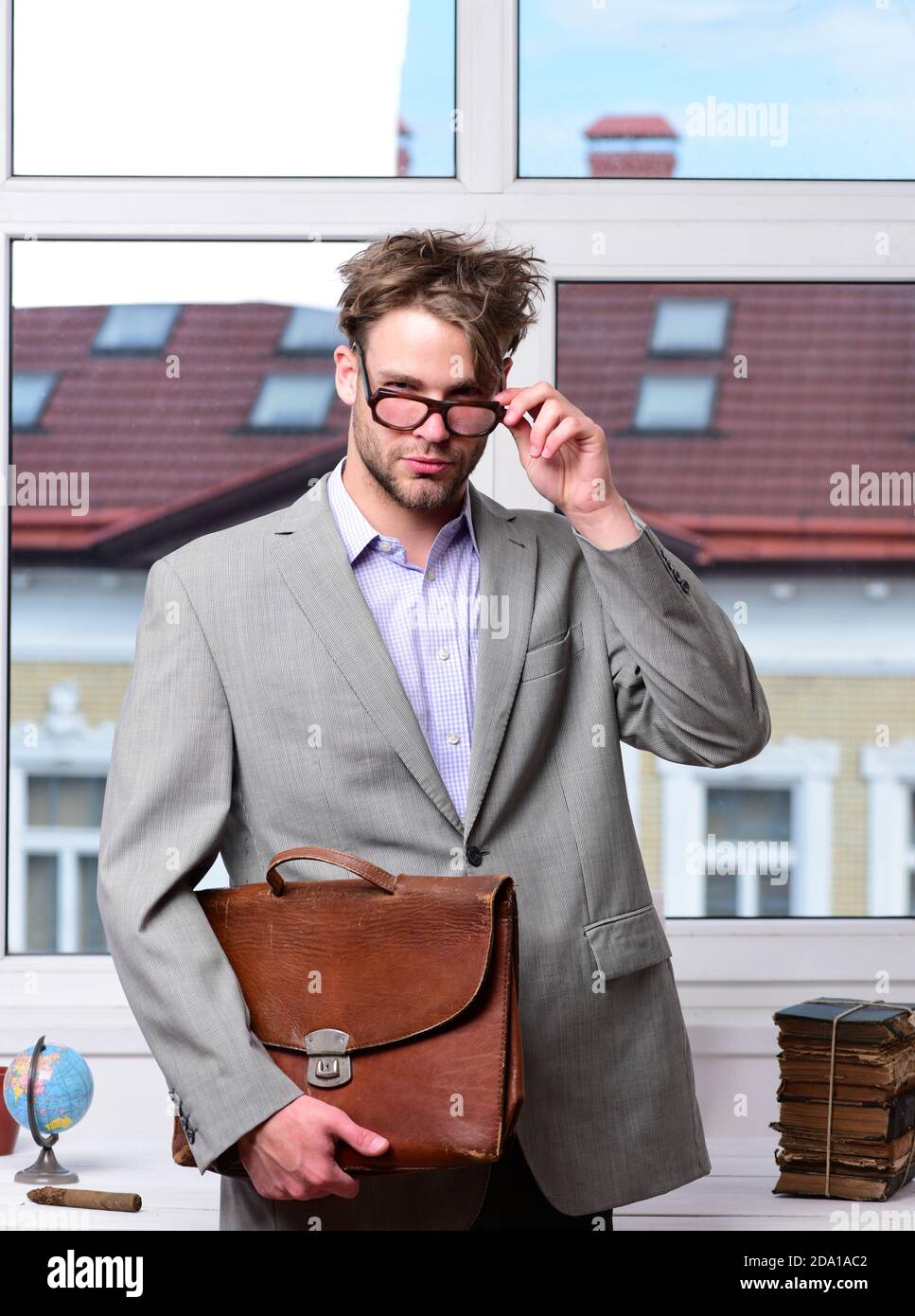 Education and work concept. Serious teacher or worker with bristle in ...
