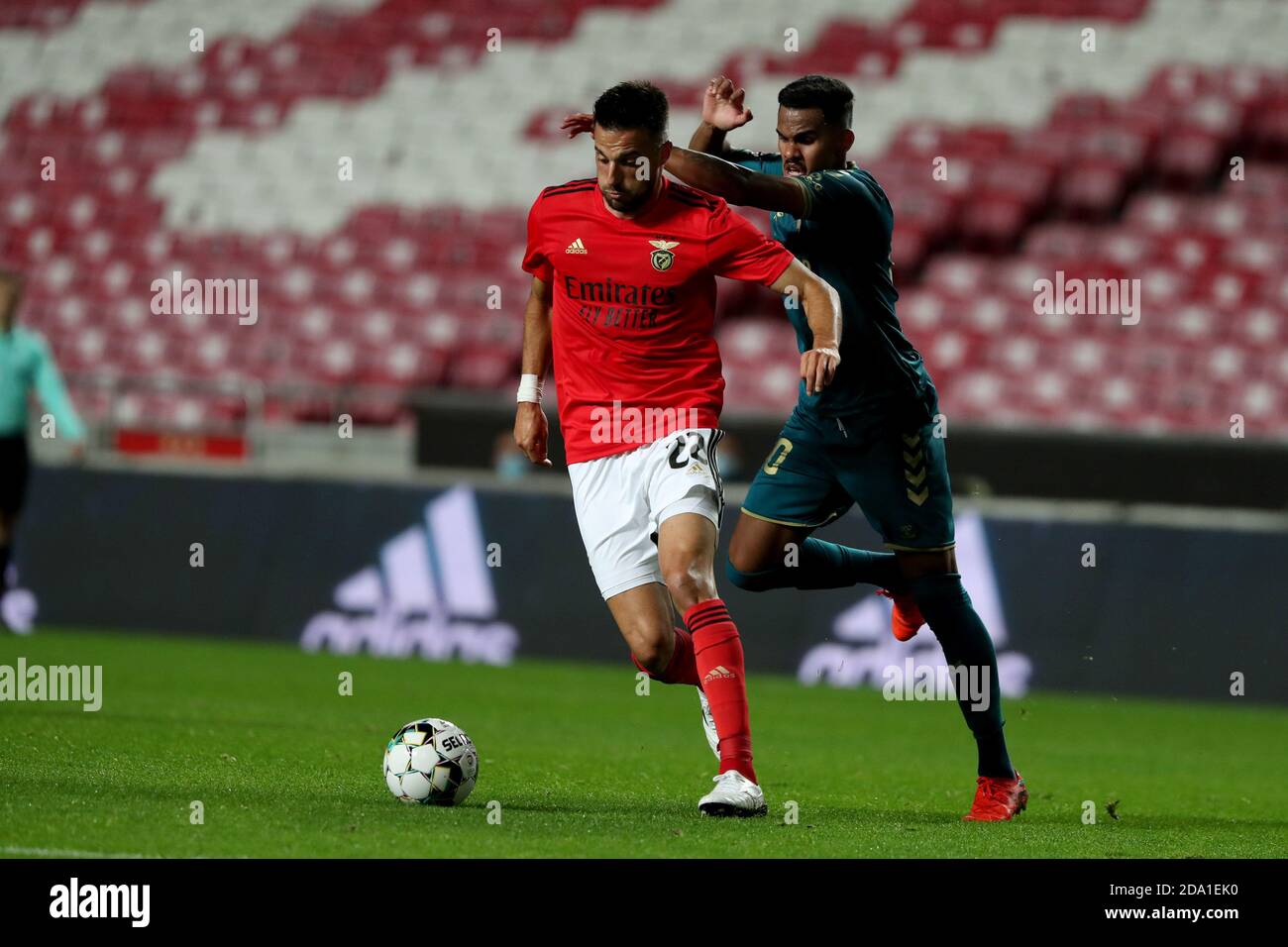 Lisbon, Portugal. 8th Nov, 2020. Andreas Samaris of SL Benfica (L) vies with Wenderson Galeno of SC Braga during the Portuguese League football match between SL Benfica and SC Braga at the Luz stadium in Lisbon, Portugal on November 8, 2020. Credit: Pedro Fiuza/ZUMA Wire/Alamy Live News Stock Photo