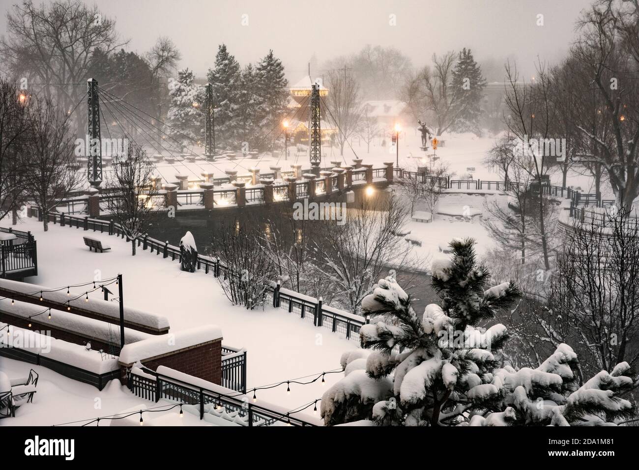 Vintage style image of Washington Avenue Bridge over Clear Creek in winter - Golden, Colorado, USA Stock Photo