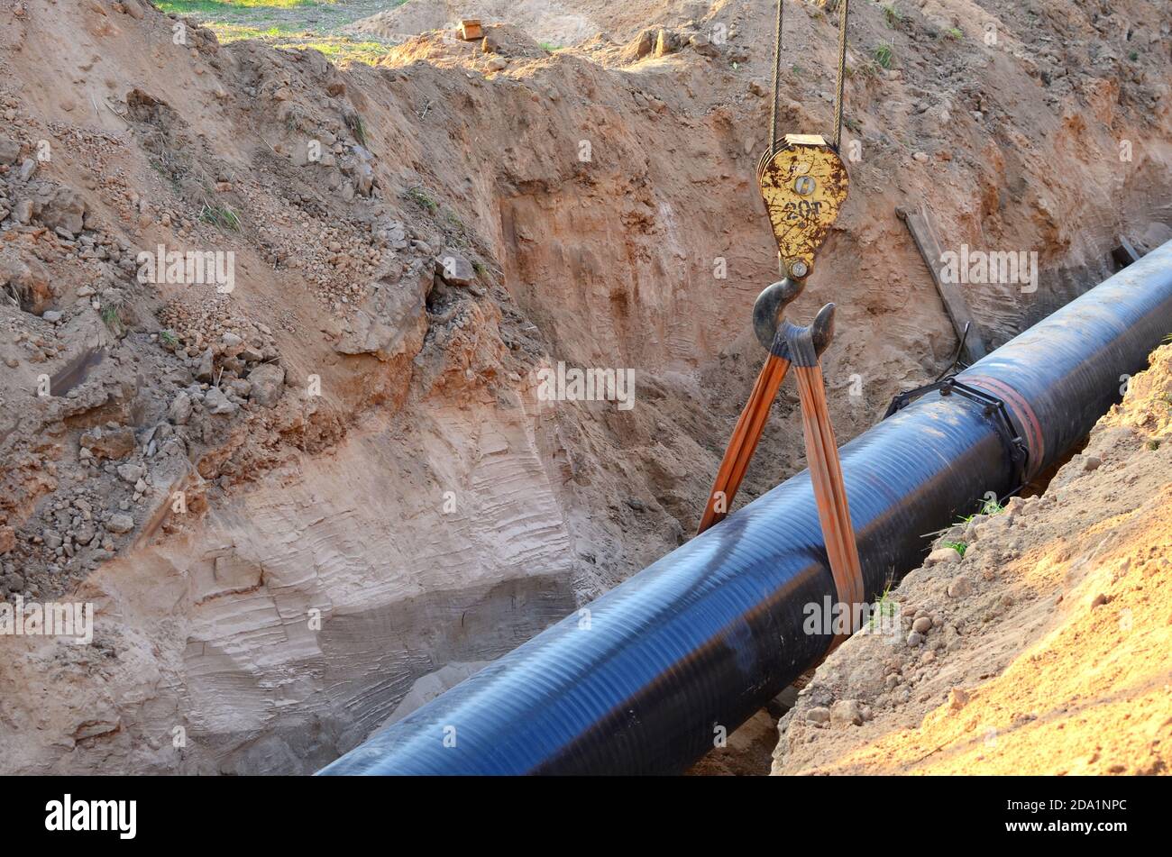 Natural gas pipeline construction work. A dug trench in the ground for