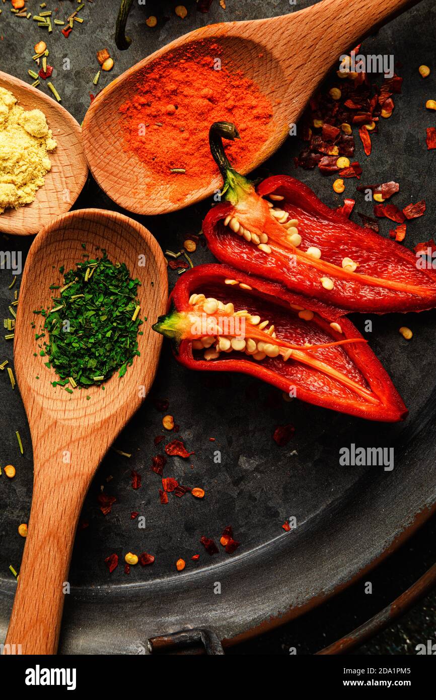 Peppers and Spices on pan Stock Photo