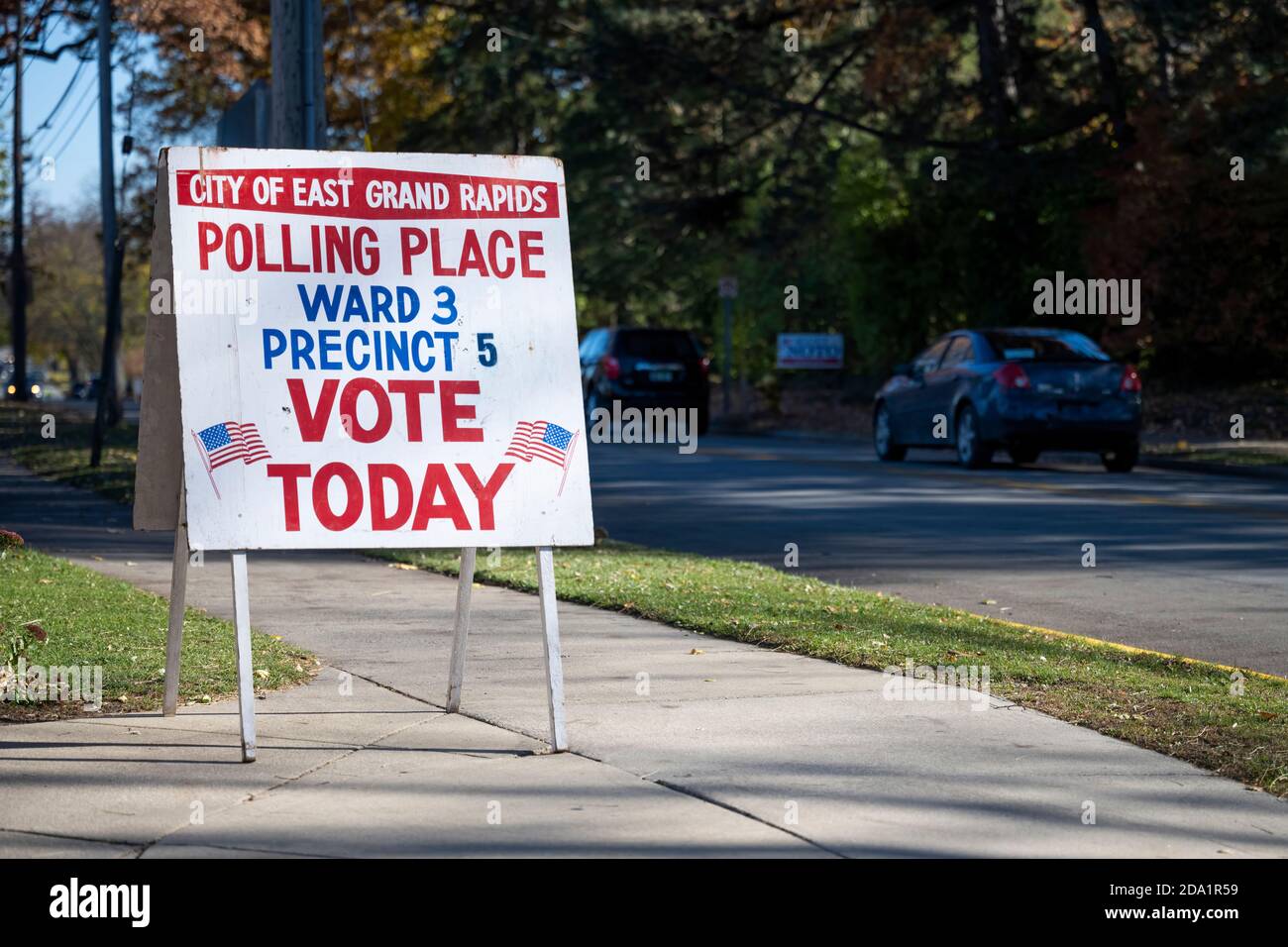 Grand Rapids, Michigan, November 3, 2020: A 'vote today' sign outside a polling station on Election Day. Stock Photo