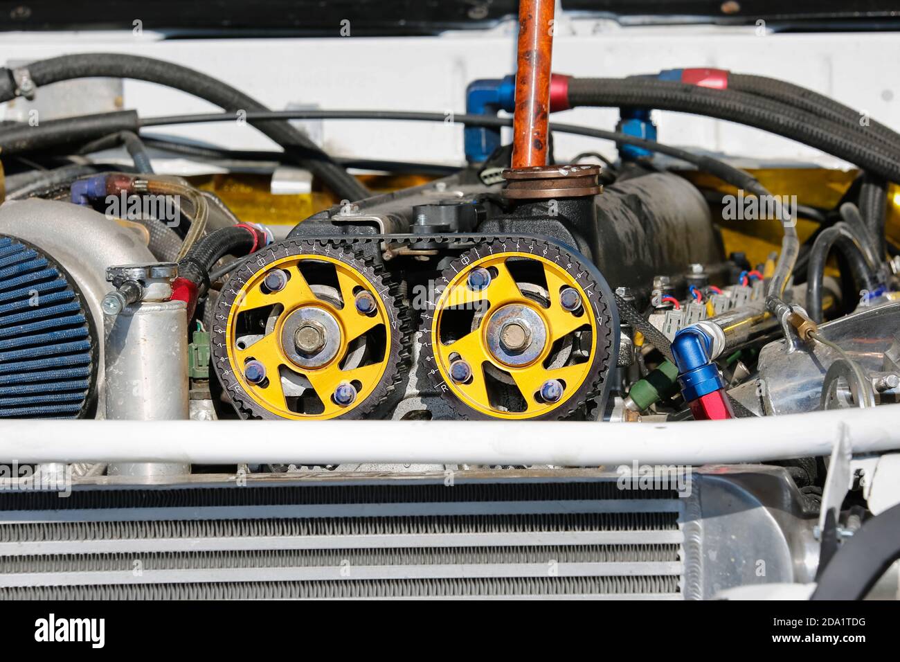 Timing belt and twin camshaft sprocket in engine racing car Stock Photo Alamy