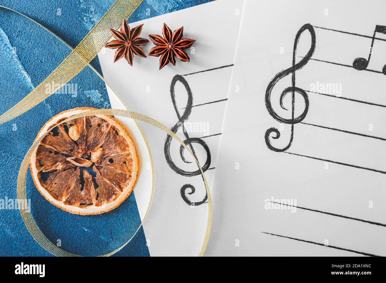 Composition with note sheets and Christmas decor on table Stock Photo