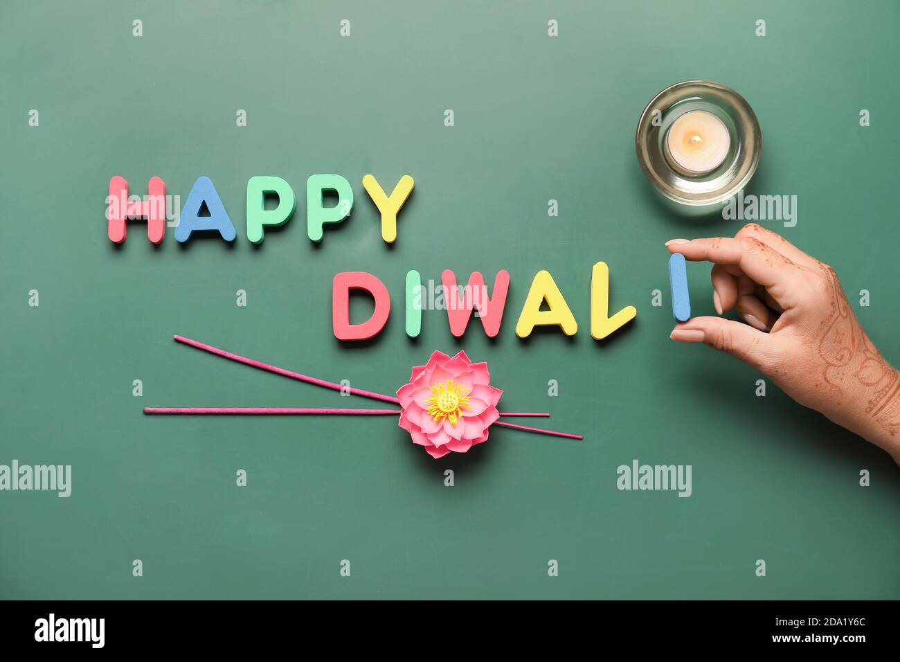 Composition with text HAPPY DIWALI on color background Stock Photo