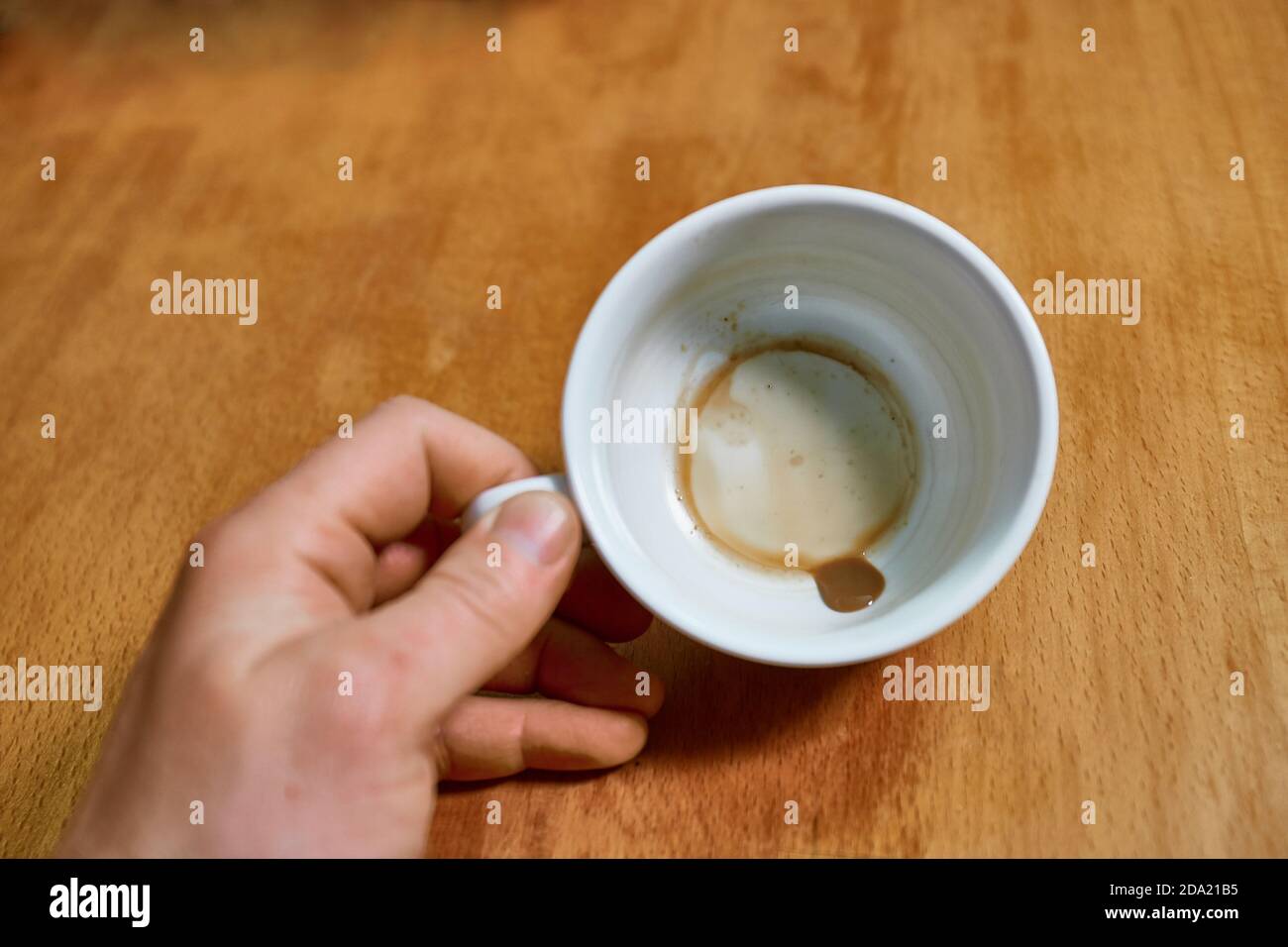 Running out of coffee, empty cup Stock Photo Alamy